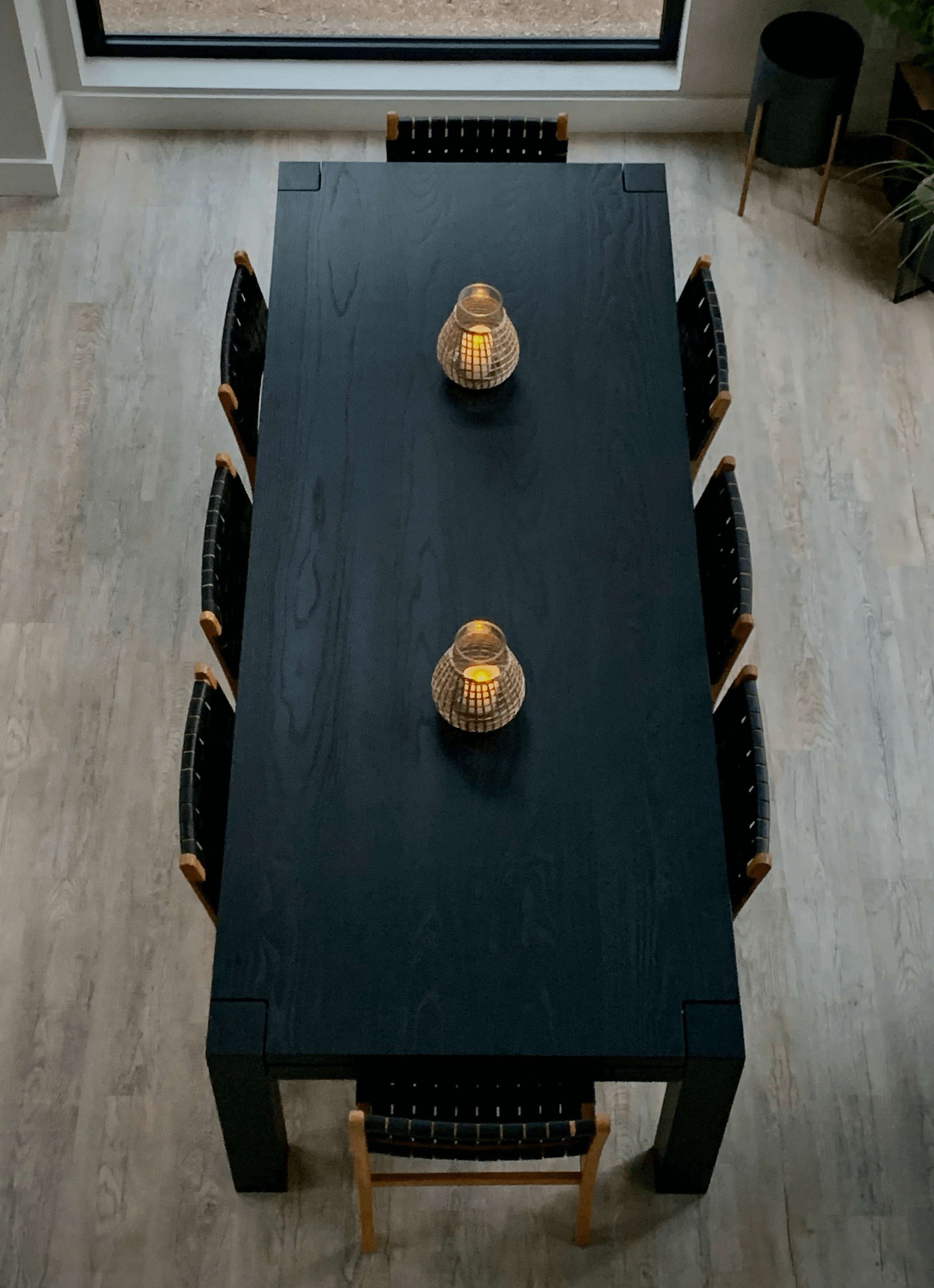 Modern European style dining table with sleek flush legs and two decorative lights, suitable for customizable size and wood tone options.