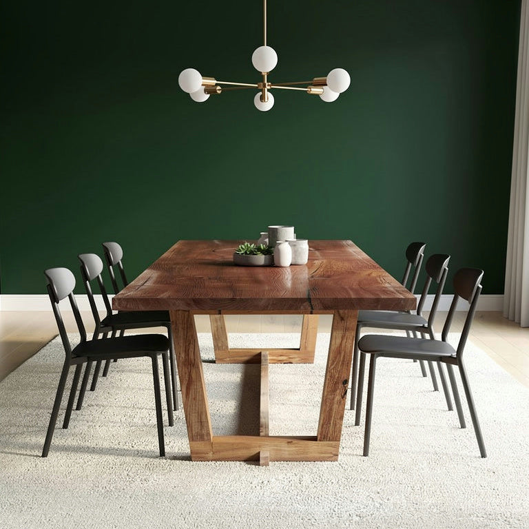 Handmade wooden dining table with unique wood grain pattern, showcasing craftsmanship and style for an elegant dining room.