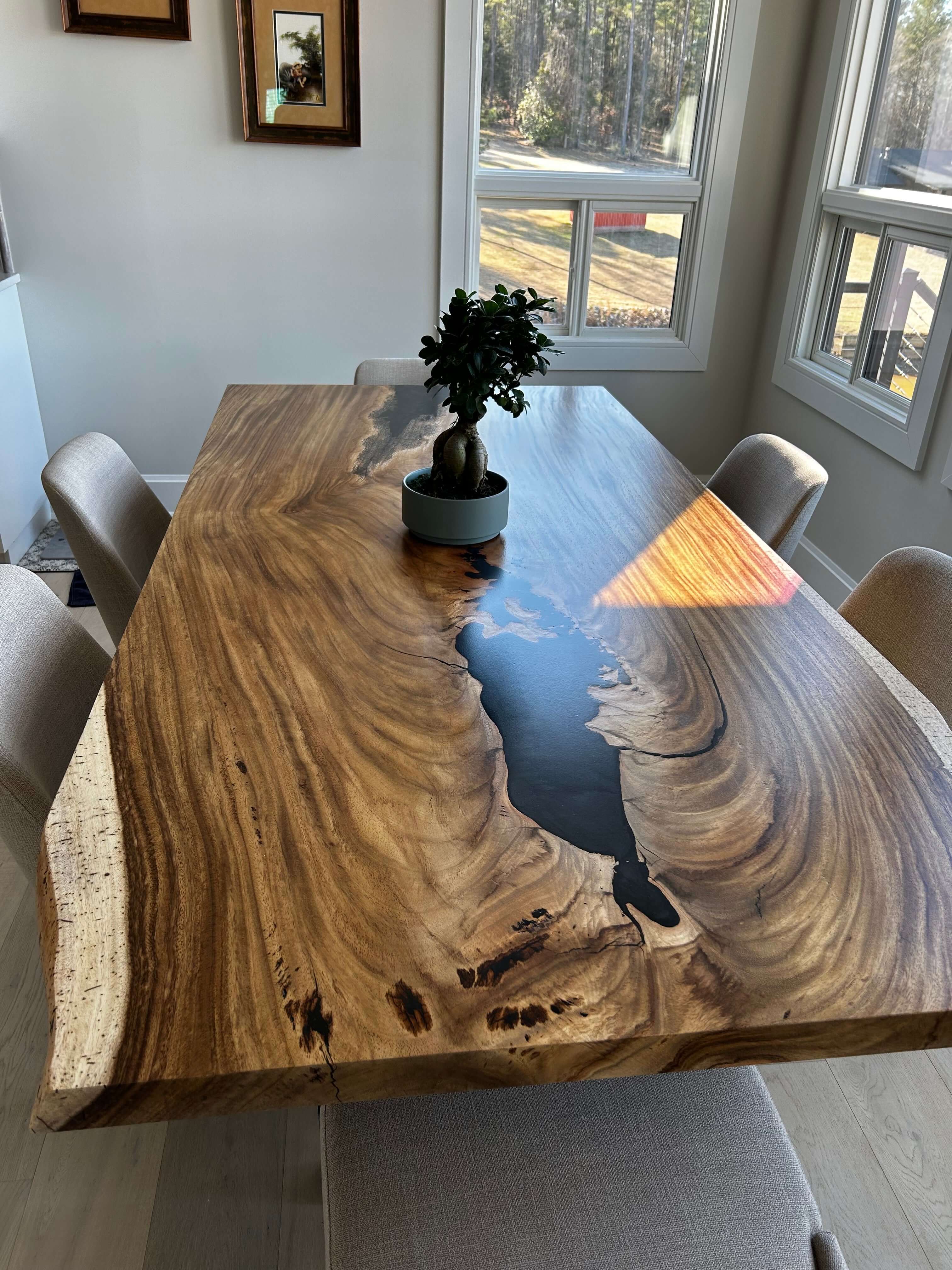 Giant Costa Rican Monkey Pod live edge table with natural wood grain and unique design, perfect for a dining room centerpiece.