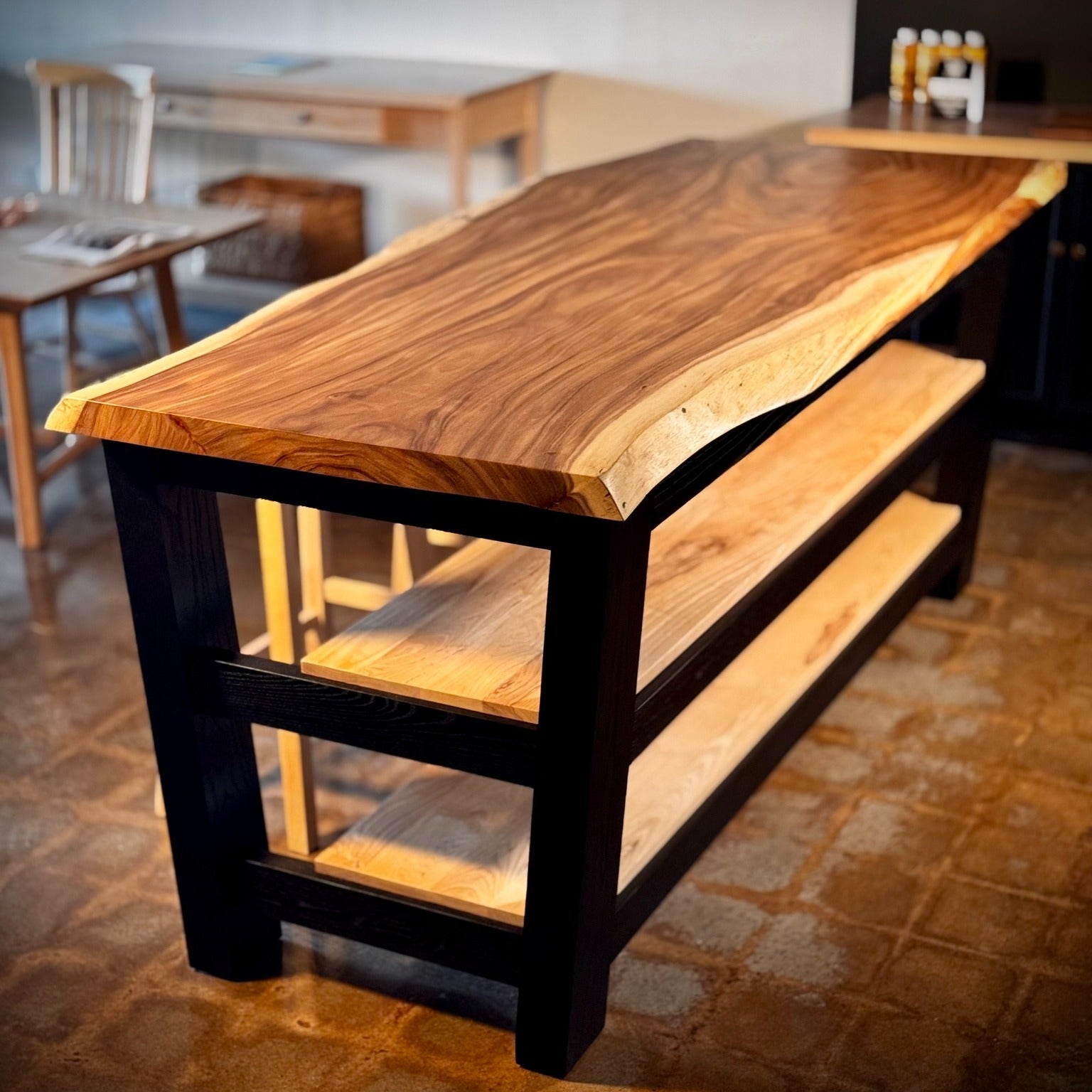 Wooden Kitchen Island with stool seating in a kitchen setting