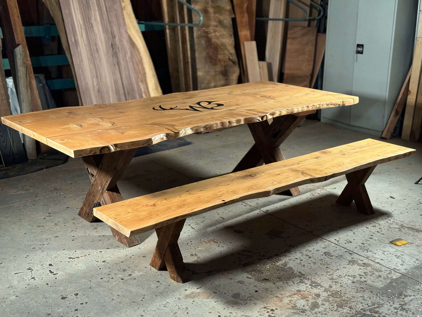 Solid wood dining table set with classic design, featuring The Medlin and matching bench, ideal for elegant dining rooms.