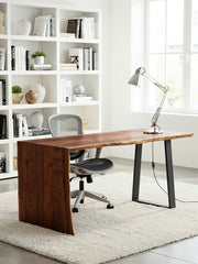 Modern office setup with a wooden desk, chair, and bookshelf.